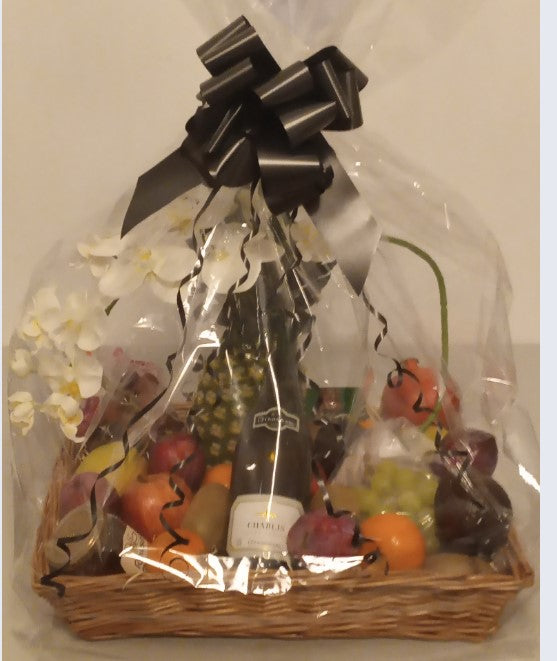Kosher Wine and Fruit Basket Gift For Any Occasion. A Refreshing Extra Large Fruit Basket With French Wine And A Flower. Idea Gift for Purim, Mazal Tov, New Home, Shiva Condolences. Delivered Golders Green, Hendon And London. FREE Standard Delivery London