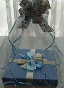 Mazal tov, it’s a boy: This gift is a great way to say Congratulations for a new baby boy. It comes with the baby's first rattle and a comforter. Treats for the grownups are two bottles of French wine, hand made chocolates and large box of assorted mints