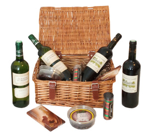 Purim Mishloach Manot Wicker Hamper With Two Bottles Of French Wine Sauvignon Blanc And Bordeaux Superior Red With Chocolate Almonds, Cremes and Rosemarie Bar. Corporate Gifts For Any Occasion. Delivered London And Throughout The UK.