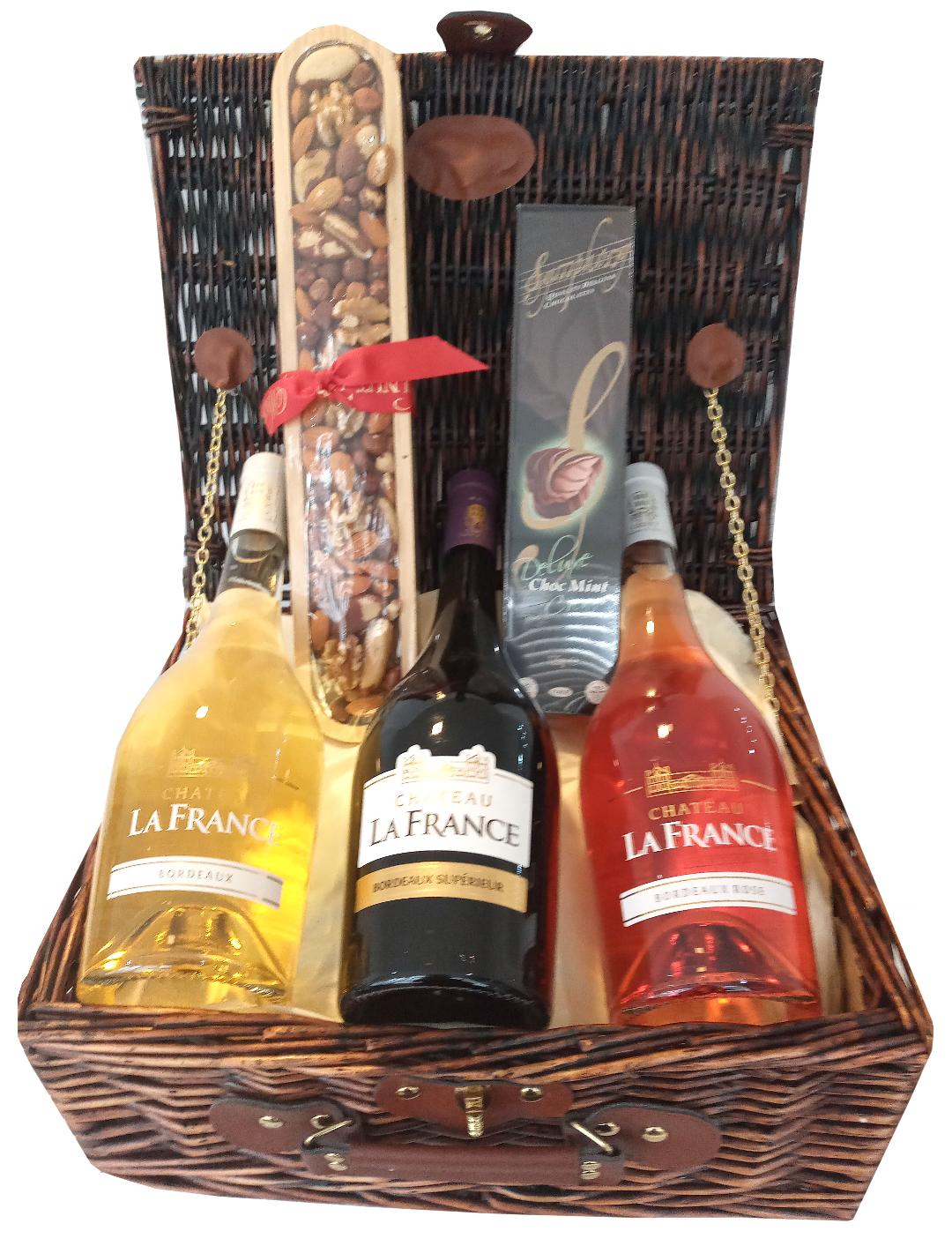 KOSHER THREE BOTTLES OF CHATEAU LA FRANCE WINES WITH NUTS AND MINT CREMES IN A WICKER HAMPER. IDEAL FOR CORPORATE GIFTS, FESTIVALS, MAZEL TOV. FREE DELIVERY NATIONWIDE. GLUTEN FREE AND VEGAN
